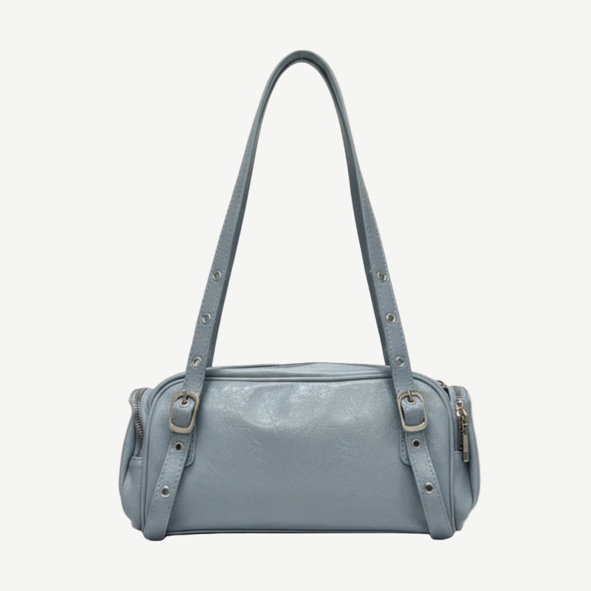 Bolso Barrel Sky Blue en material vegano premium con diseño cilíndrico, doble asa ajustable y cremalleras laterales. Ligero, moderno y versátil para looks diarios y minimalistas.