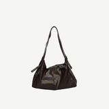 Bolso Soft Chocolate Draped en material vegano premium, diseño drapeado y asa larga. Ligero, elegante y versátil, ideal para looks diarios y casuales.