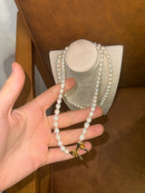 Collar Freshwater 6–7 mm · Cierre T-Bar Redondo Oro Flash